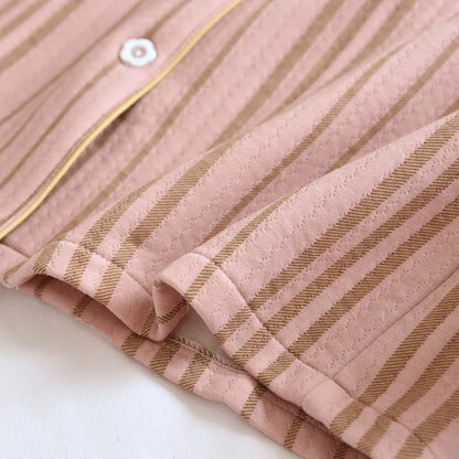 Schwarzer und rosa Matching Pyjamas Couple