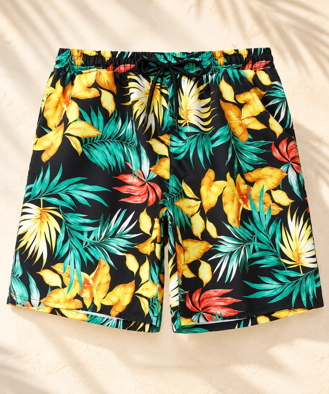 Schwimmshorts Vater Sohn – Detail des gelben Tropenmusters