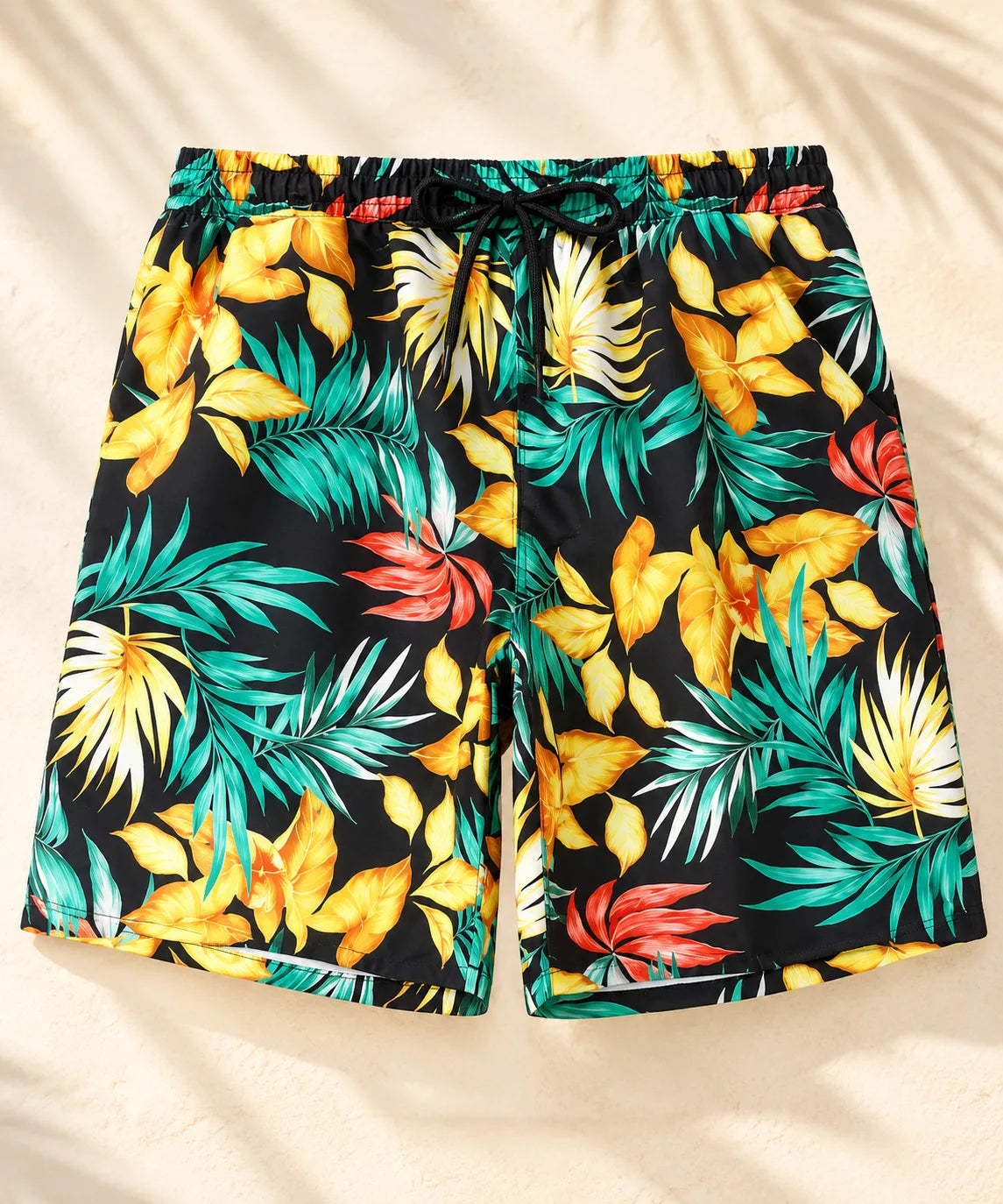 Schwimmshorts Vater Sohn – Detail des gelben Tropenmusters